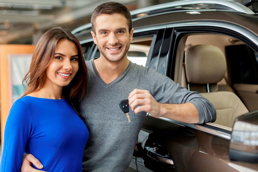 couple with new car