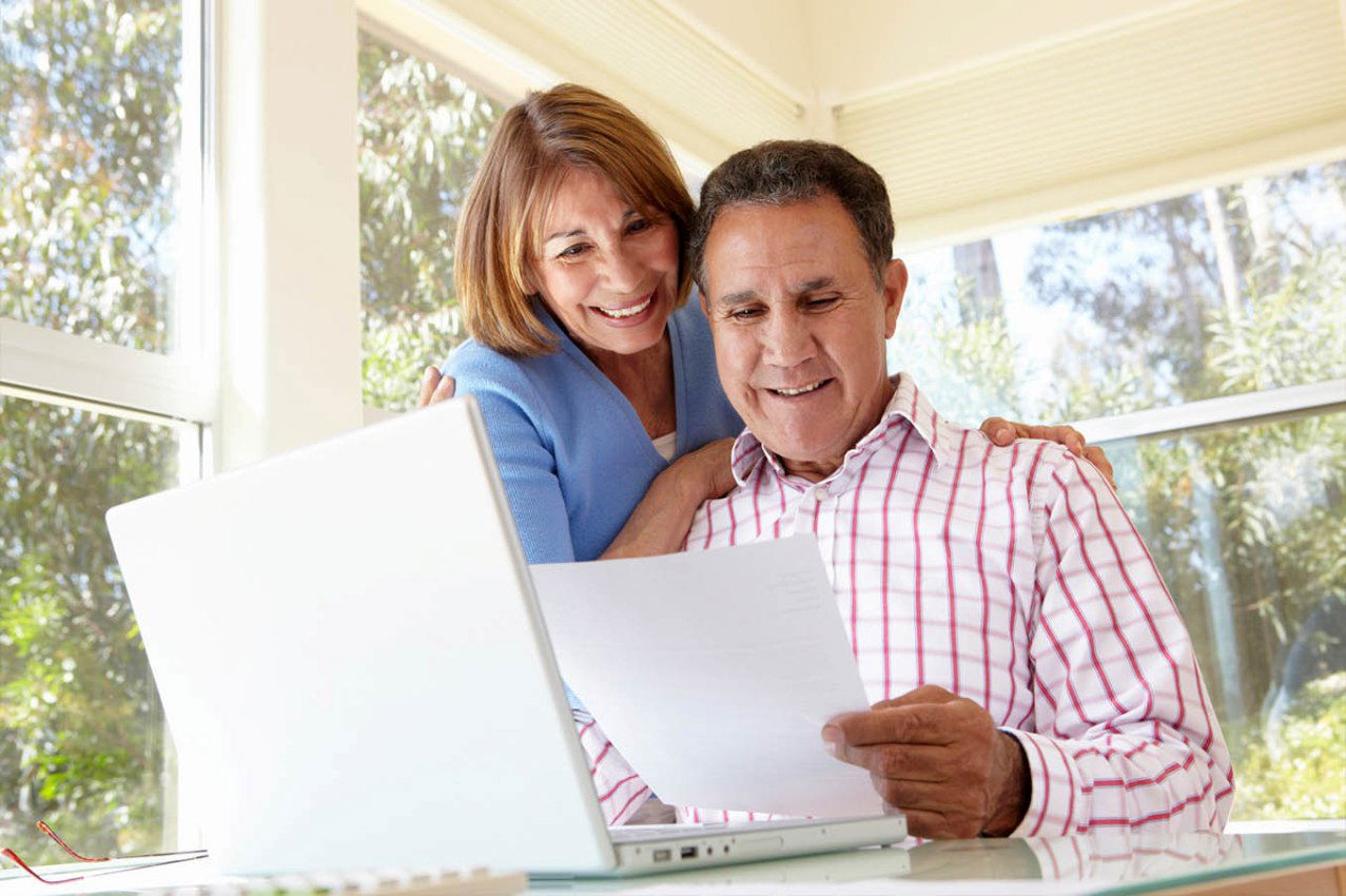 couple reading documents