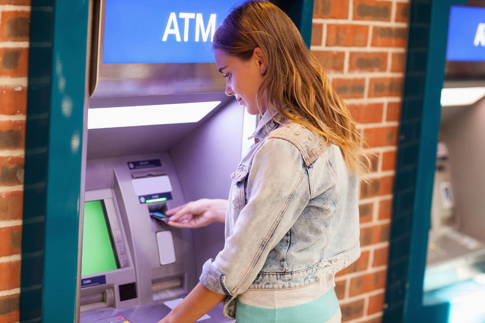 woman using atm