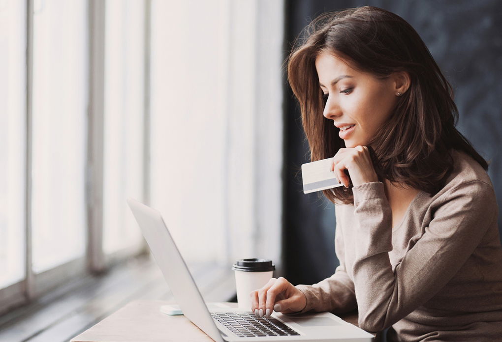 lady holding credit card