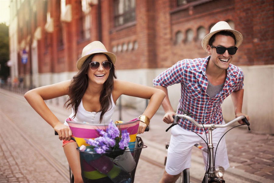 young people riding bikes