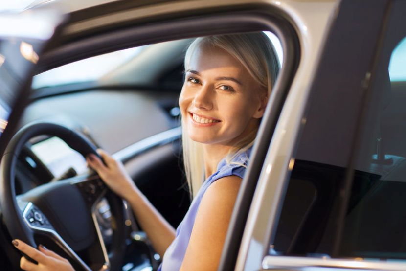 woman in new car