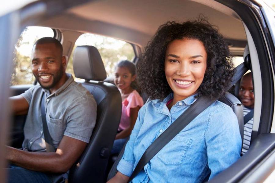 family in car