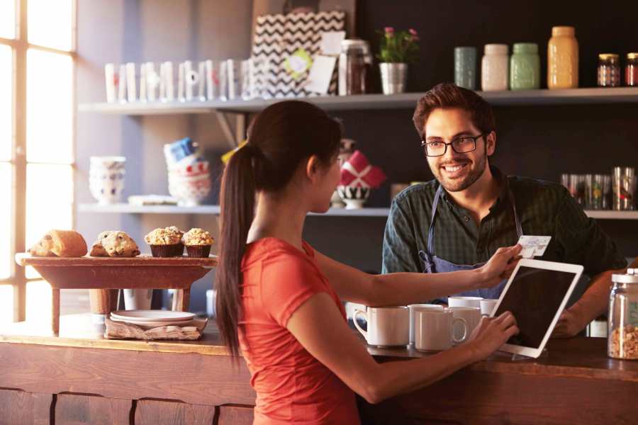 woman using credit card