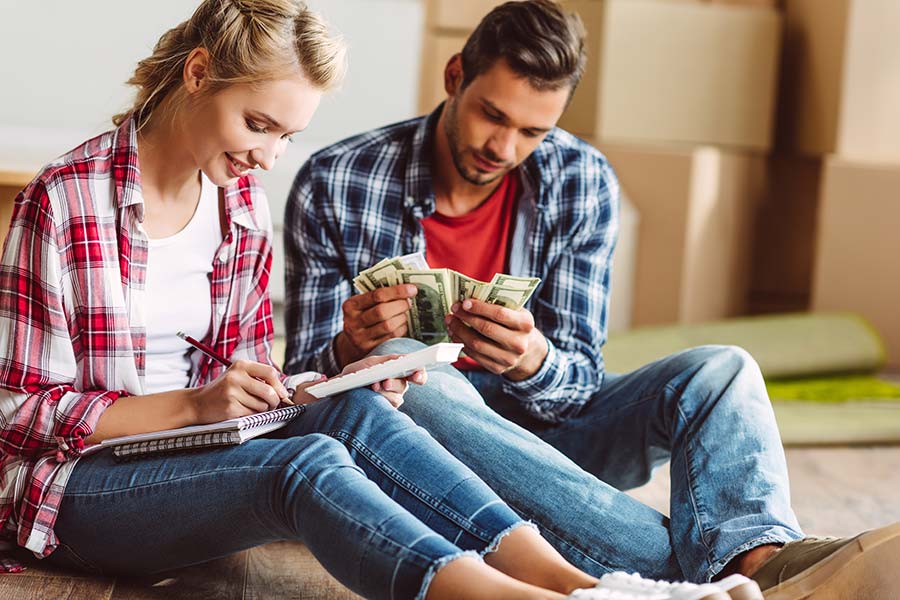 couple holding cash