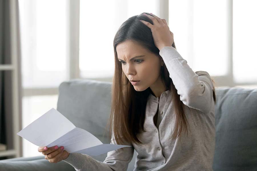 woman looking at documents