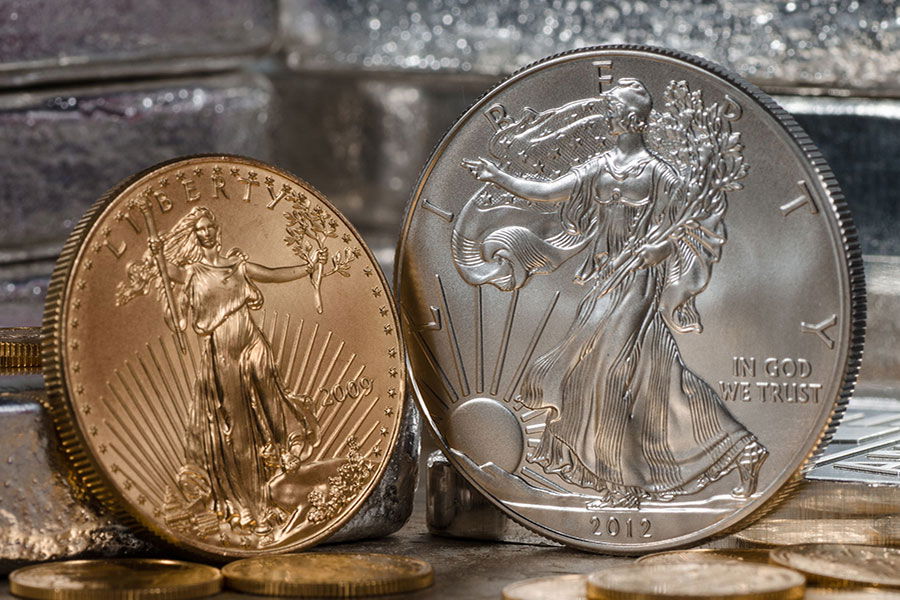 gold and silver American eagle coins