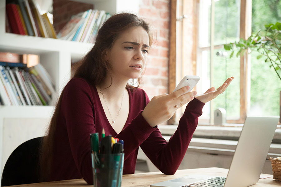 woman annoyed by phone call