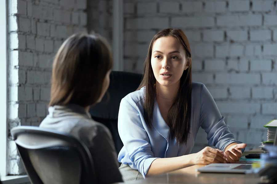 client talking to attorney