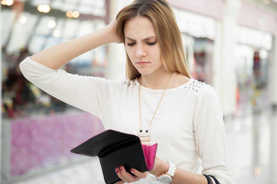 woman holding wallet