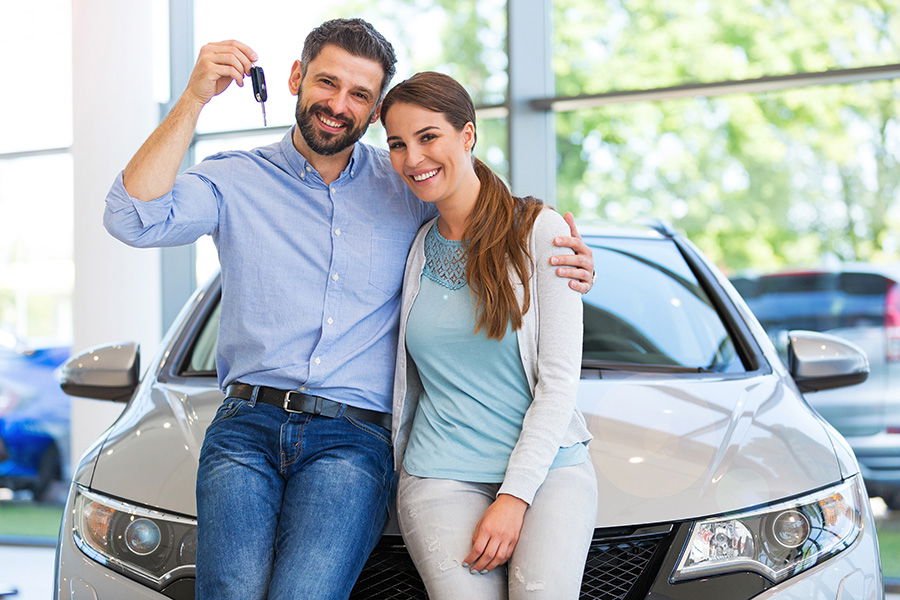 couple buying a car