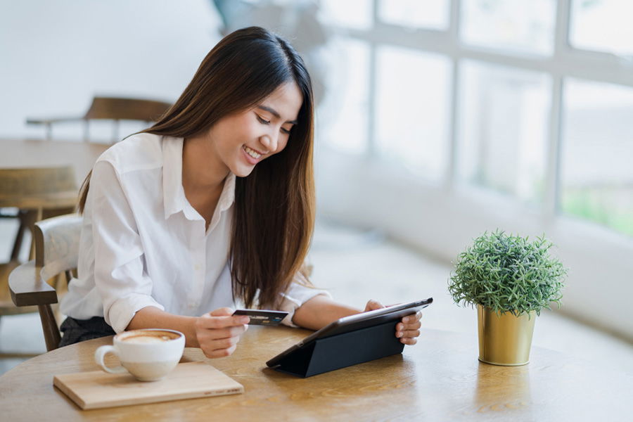 woman using debit card