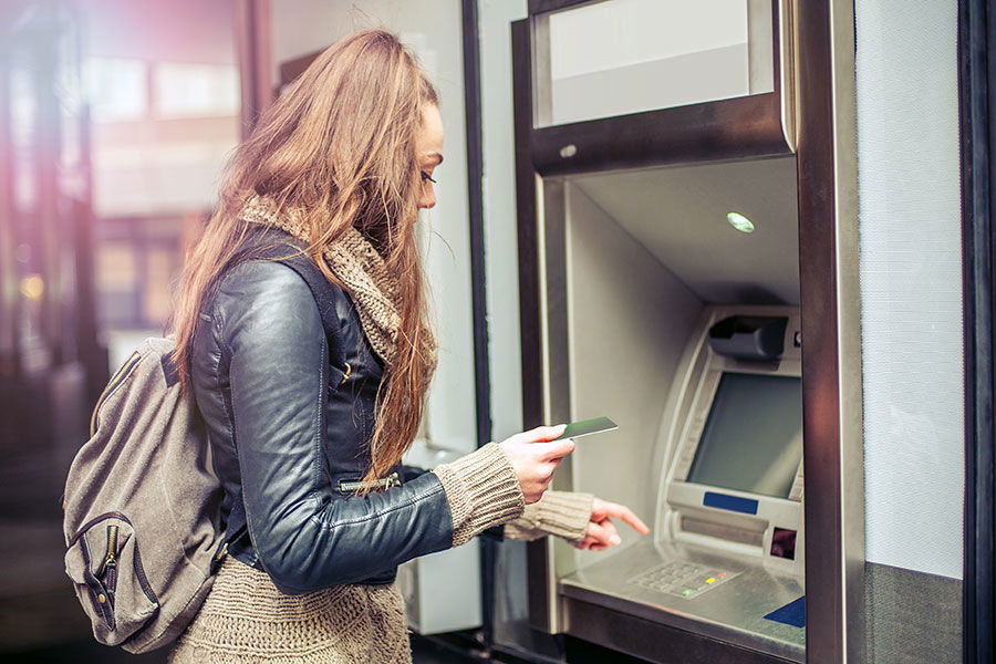 woman using ATM