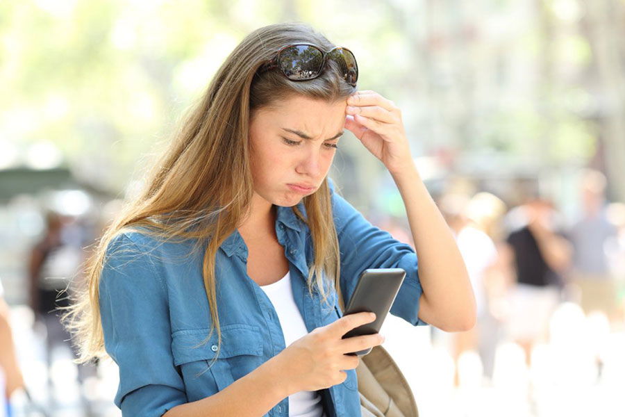 frustrated woman on phone