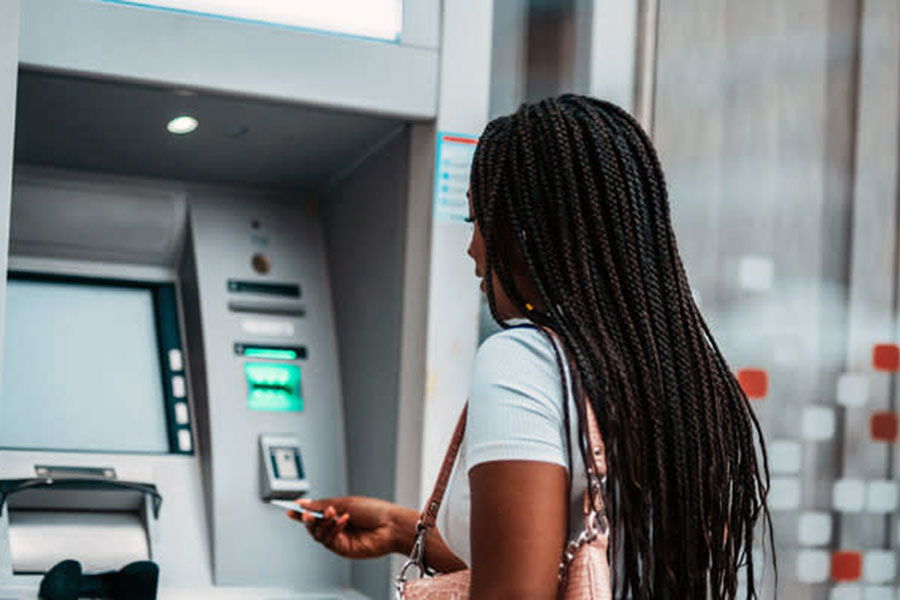 woman using ATM