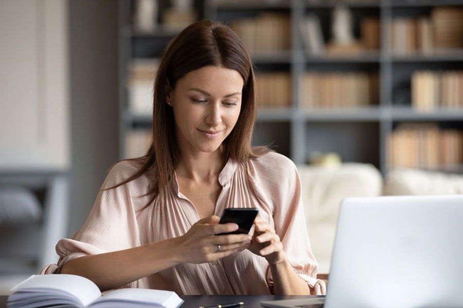 woman looking at phone