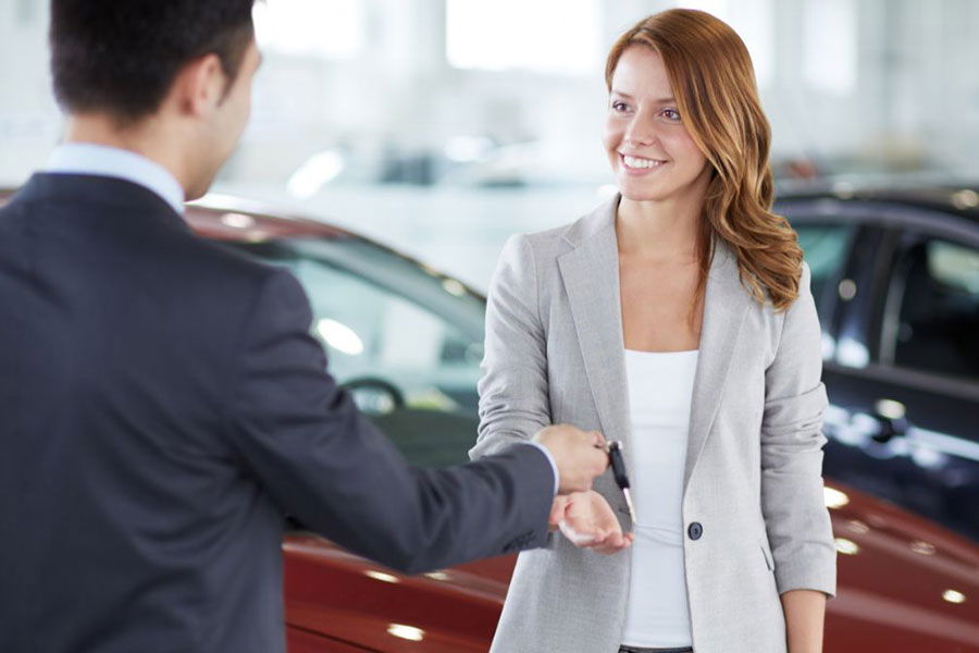 woman buying car