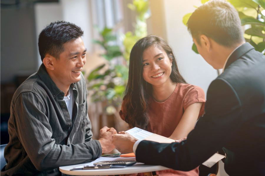 couple meeting with financial advisor