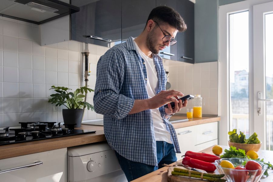 man looking at phone