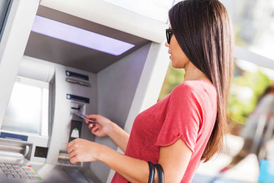 woman using ATM