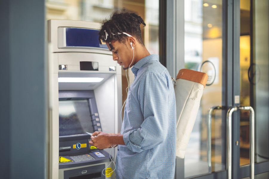 man using ATM