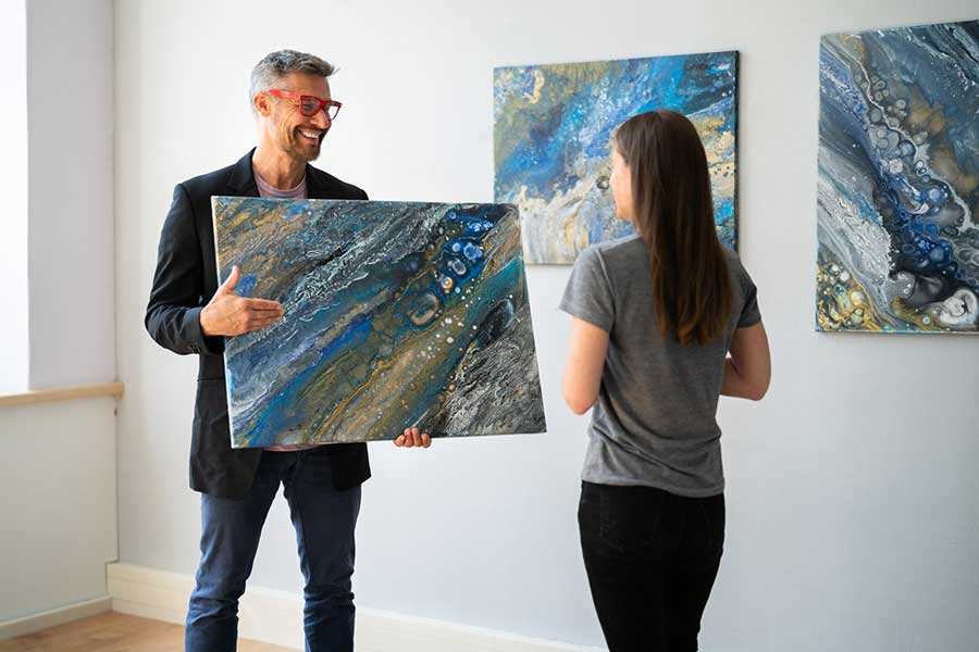 art collector buying painting