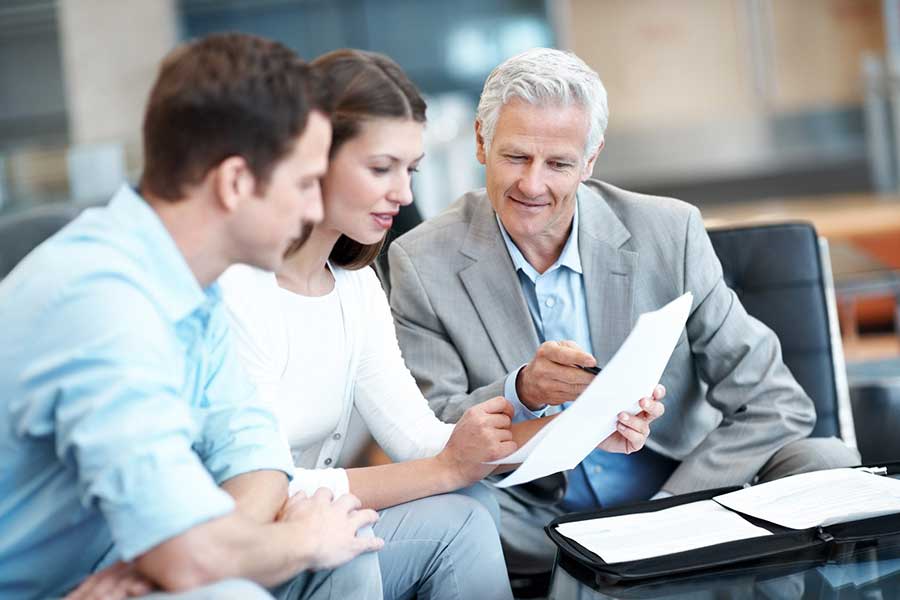 couple meeting with financial advisor