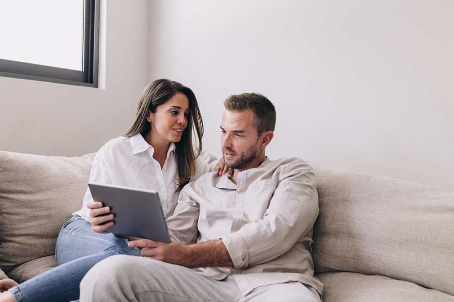 couple saving money at home