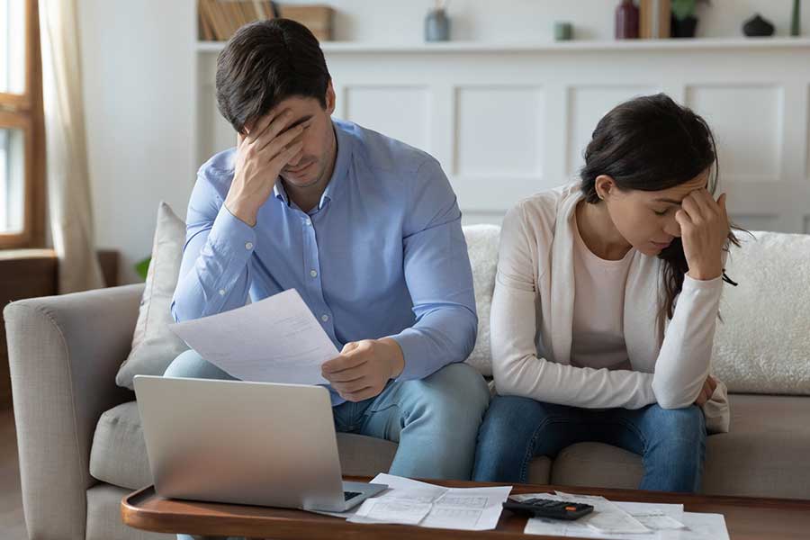 couple stressed about debt