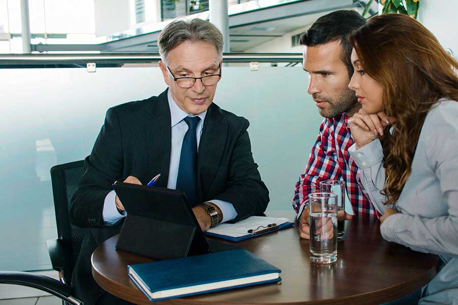 credit counselor helping clients