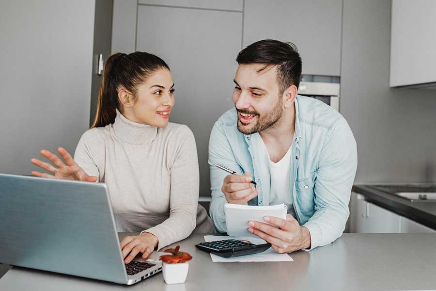 couple budgeting at home