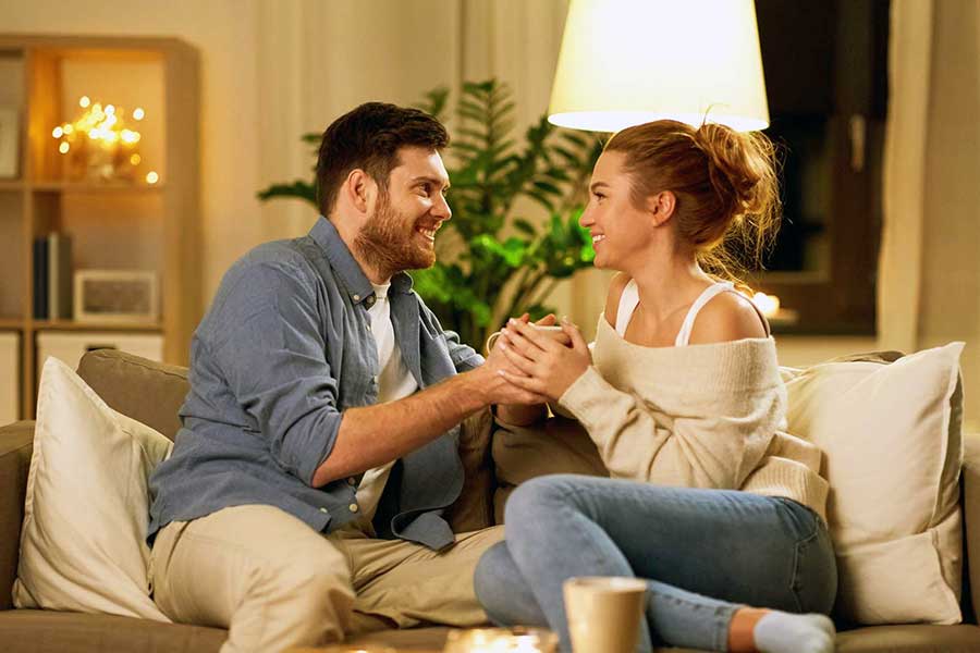 couple talking about finances at home