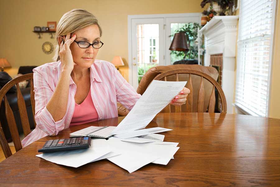 woman reviewing bills