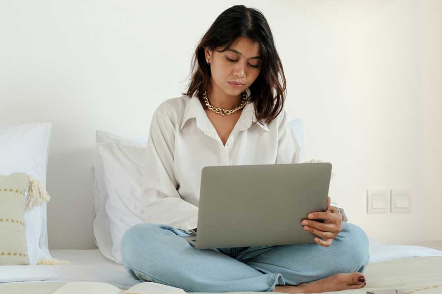 woman reviewing finances at home