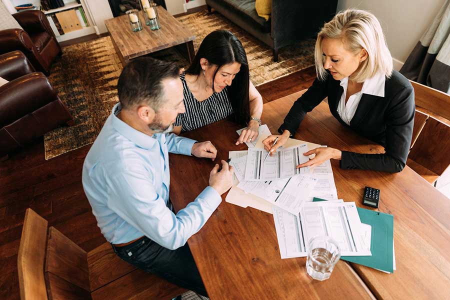 couple meeting with financial advisor