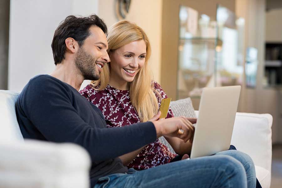 couple paying bills online