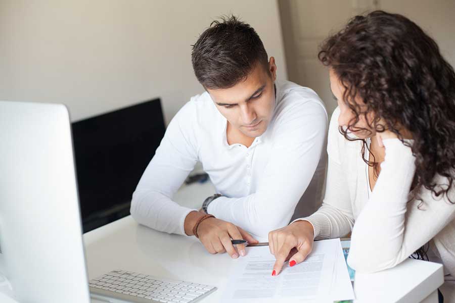 couple reviewing finances at home