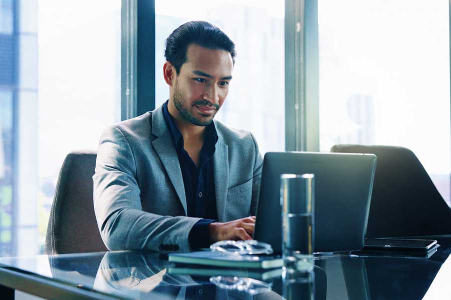 man reading financial news