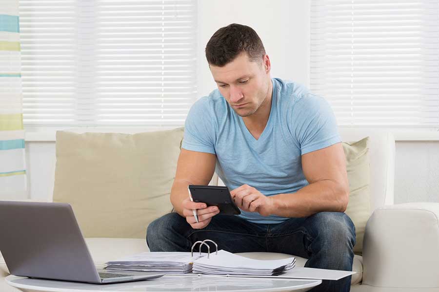 man reviewing finances