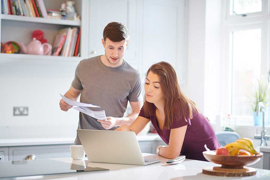 couple paying bills online