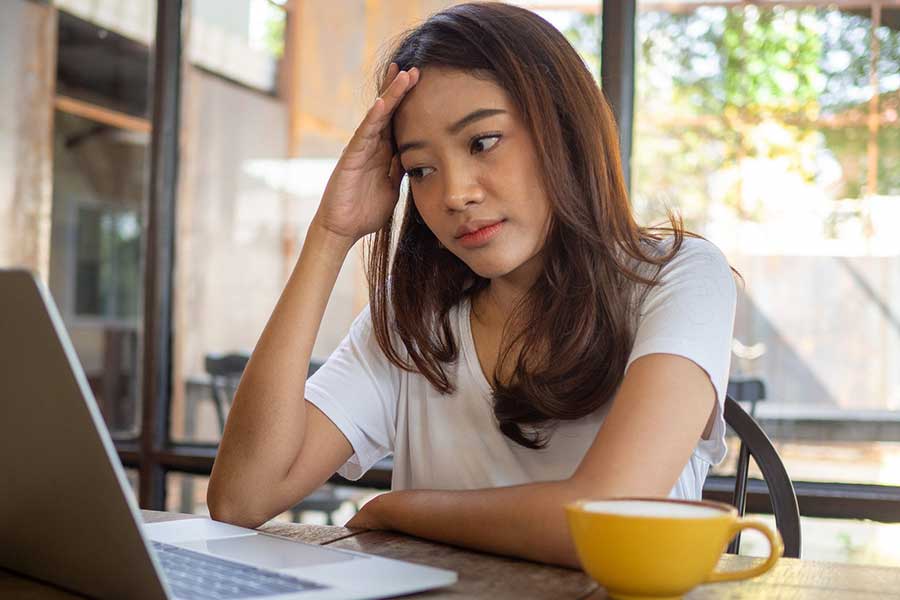 woman confused by credit card bill