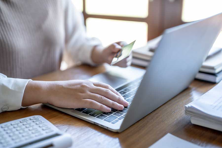 woman using a charge card