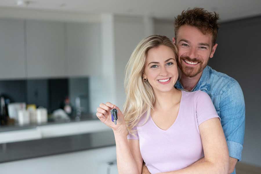 couple buying a house